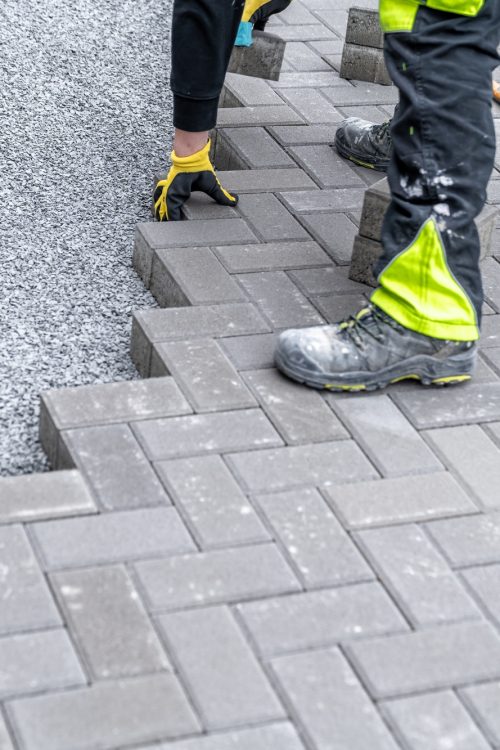 construction of a sidewalk from concrete blocks